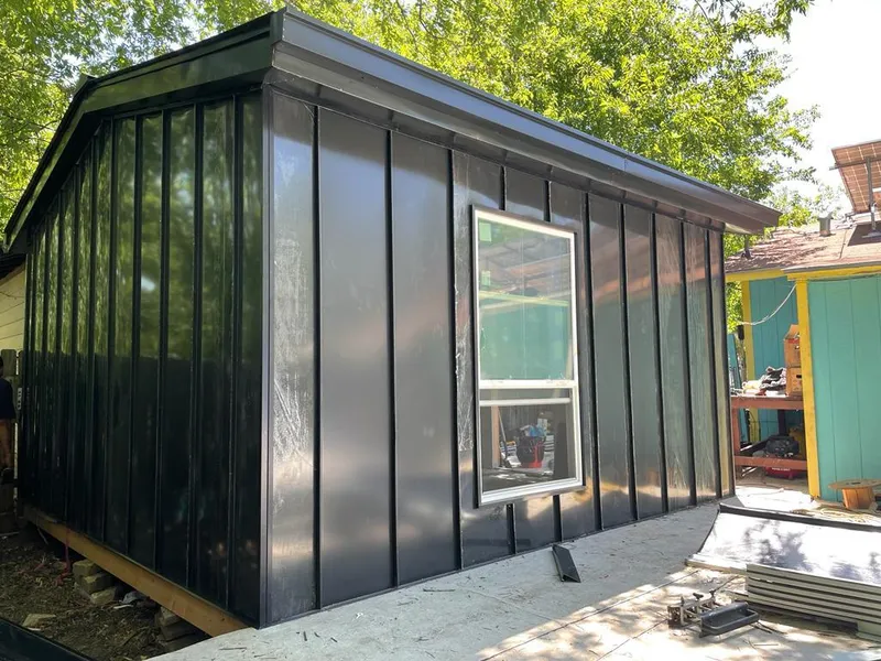 Black standing seam metal wall panels for Metal Roof Installation in Moberly