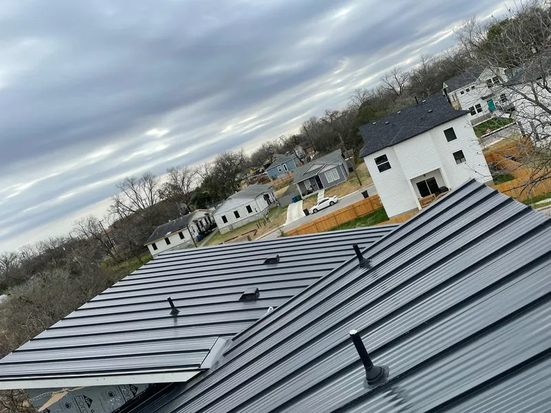 Standing seam metal roof panels with vents for Skylight Repair in Moberly